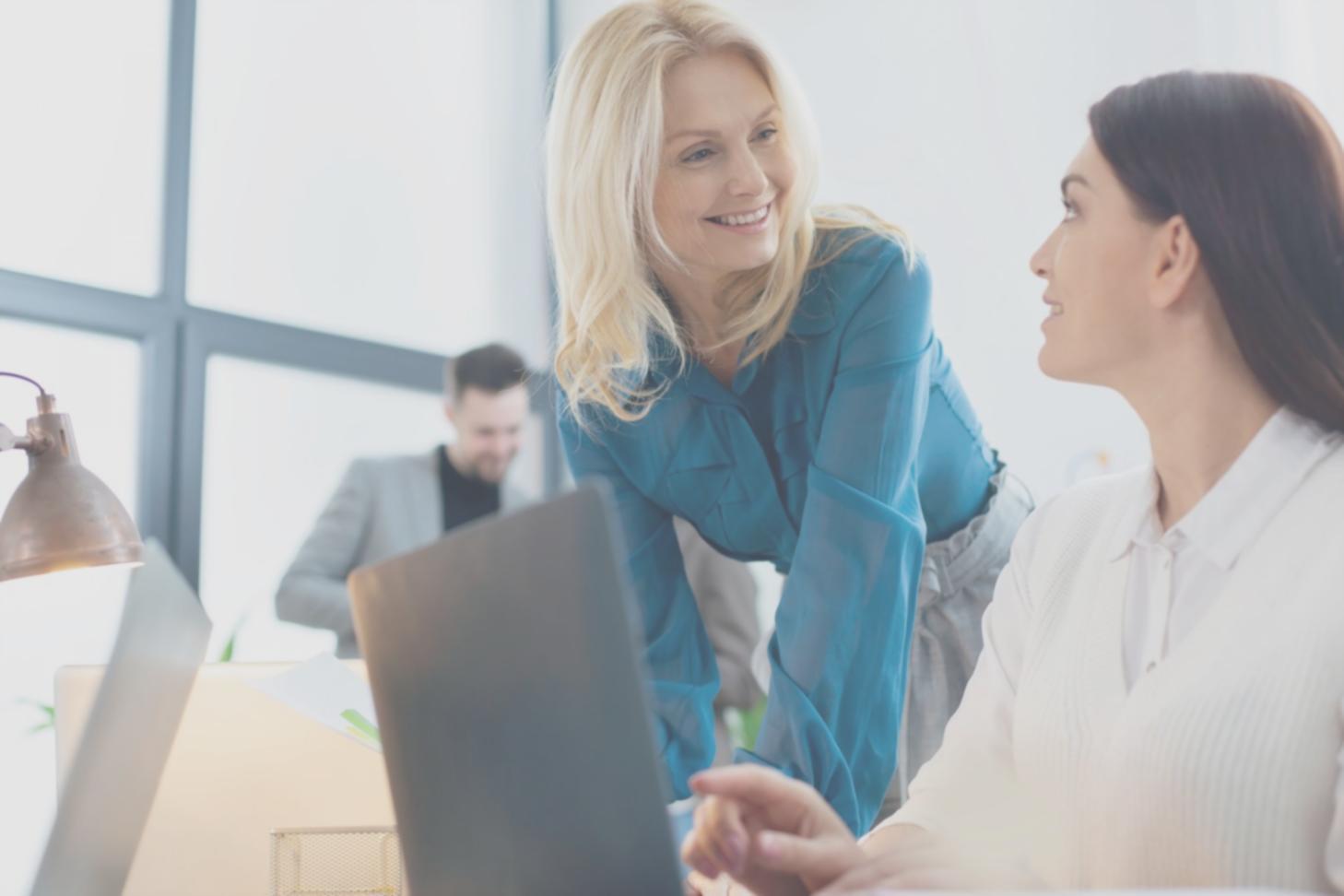 Person working through income calculations and budget planning exercises